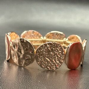 Elegant Gold and Silver Textured Bracelet